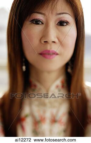 Mature woman looking at camera, portrait View Large Photo Image Stock Image - Mature woman looking at camera, portrait. Fotosearch