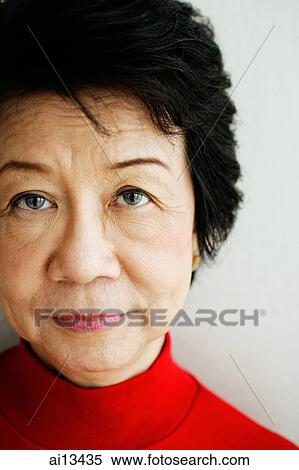 Mature woman looking at camera, portrait View Large Photo Image Stock Photography - Mature woman looking at camera, portrait. Fotosearch