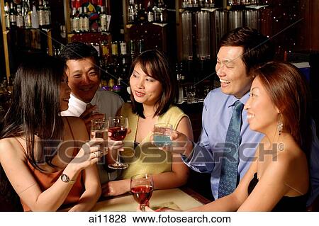 Men and women at bar View Large Photo Image Stock Photo - Men and women at bar. Fotosearch