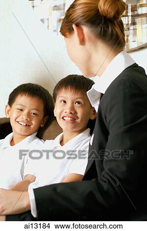 Picture - Mother with two children. Fotosearch