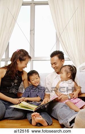 Parents with son and daughter sitting together, bonding View Large Photo Image Stock Photograph - Parents with son and daughter sitting together, bonding. Fotosearch