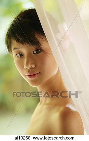 Portrait of a young woman View Large Photo Image Stock Photo - Portrait of a young woman. Fotosearch