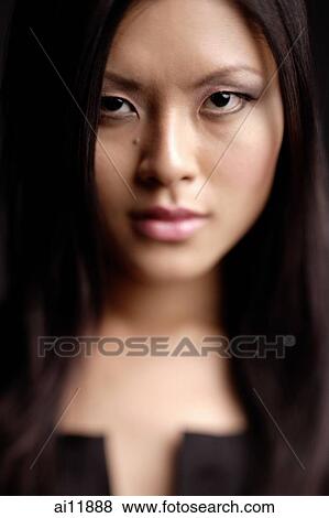 Portrait of a young woman View Large Photo Image Stock Photo - Portrait of a young woman. Fotosearch