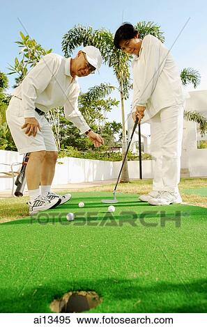 Senior couple playing golf View Large Photo Image Stock Photography - Senior couple playing golf. Fotosearch
