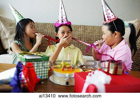 Three girls with noisemakers and party hats View Large Photo Image Stock Image - Three girls with noisemakers and party hats. Fotosearch