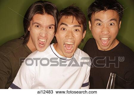 Three young men, shouting, looking at camera View Large Photo Image Stock Image - Three young men, shouting, looking at camera. Fotosearch