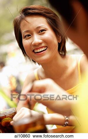 Two friends at a cafe View Large Photo Image Stock Image - Two friends at a cafe. Fotosearch