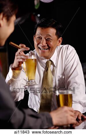 Two men drinking beer. View Large Photo Image Stock Image - Two men drinking beer.. Fotosearch