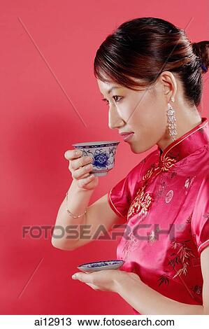Woman drinking tea View Large Photo Image Stock Image - Woman drinking tea. Fotosearch