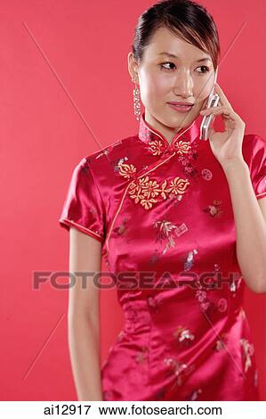 Woman holding mobile phone View Large Photo Image Stock Photo - Woman holding mobile phone. Fotosearch
