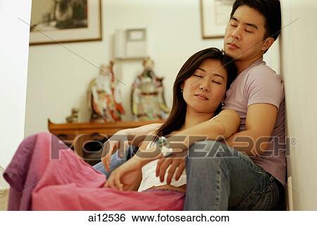 Woman leaning against man, eyes closed View Large Photo Image Stock Photograph - Woman leaning against man, eyes closed. Fotosearch
