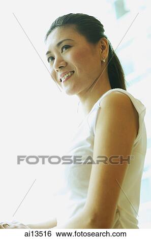 Stock Photograph - Woman, looking away, portrait. Fotosearch
