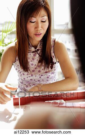 Women playing mahjong View Large Photo Image Stock Image - Women playing mahjong. Fotosearch