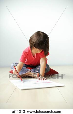 Young girl drawing on drawing pad. View Large Photo Image Stock Image - Young girl drawing on drawing pad.. Fotosearch