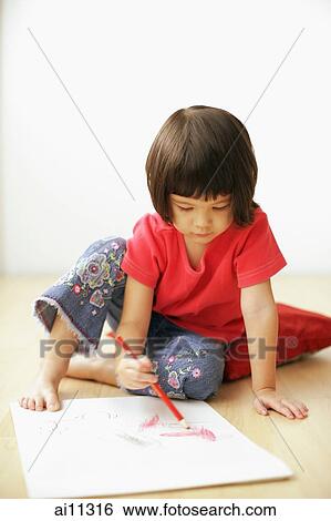 Young girl drawing on drawing pad, sitting on floor View Large Photo Image Stock Photograph - Young girl drawing on drawing pad, sitting on floor. Fotosearch