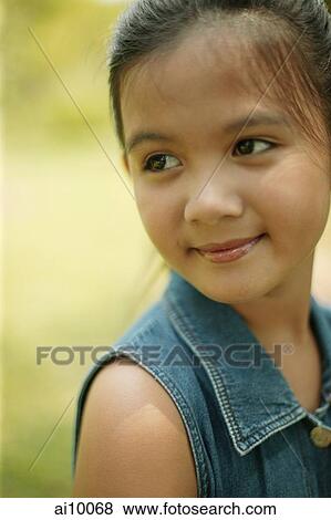 Young girl smiling, portrait View Large Photo Image Stock Photo - Young girl smiling, portrait. Fotosearch