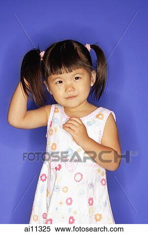 Young girl, with hand behind head View Large Photo Image Stock Photography - Young girl, with hand behind head. Fotosearch
