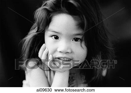 Young girl with hand on chin, portrait View Large Photo Image Stock Image - Young girl with hand on chin, portrait. Fotosearch