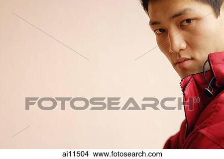Young man looking at camera View Large Photo Image Picture - Young man looking at camera. Fotosearch