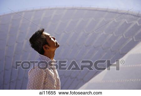 Young man, looking up, profile View Large Photo Image Stock Photography - Young man, looking up, profile. Fotosearch
