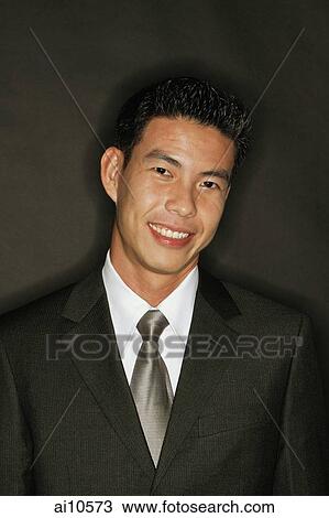Young man smiling, portrait View Large Photo Image Stock Image - Young man smiling, portrait. Fotosearch