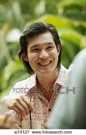 Young man smiling, portrait View Large Photo Image Stock Photo - Young man smiling, portrait. Fotosearch
