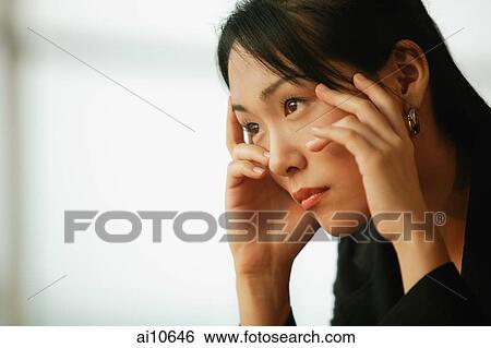 Young woman, hands on head View Large Photo Image Stock Photograph - Young woman, hands on head. Fotosearch