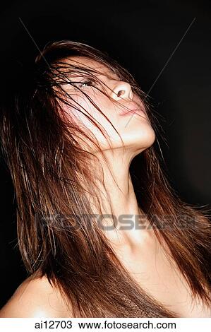Young woman, head shot with wet hair View Large Photo Image Stock Image - Young woman, head shot with wet hair. Fotosearch