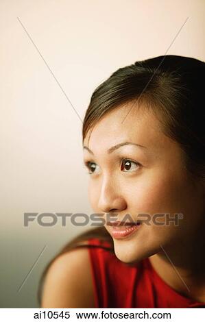 Young woman looking away View Large Photo Image Stock Photography - Young woman looking away. Fotosearch