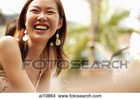 Young woman smiling, portrait View Large Photo Image Picture - Young woman smiling, portrait. Fotosearch