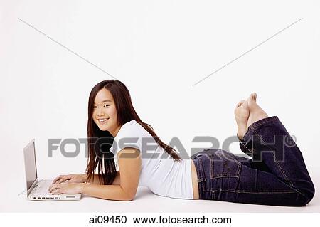 Young woman with laptop. View Large Photo Image Stock Image - Young woman with laptop.. Fotosearch