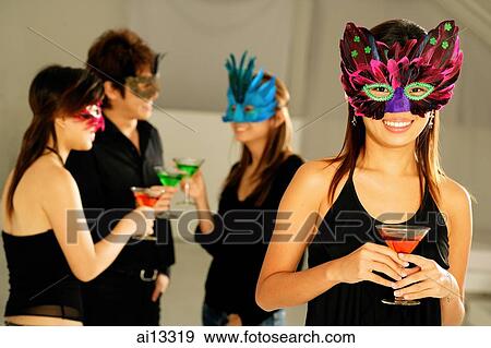 Young woman with mask, looking at camera, people in the background View Large Photo Image Stock Photo - Young woman with mask, looking at camera, people in the background. Fotosearch