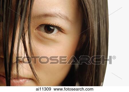 Young woman with wet hair, close-up View Large Photo Image Stock Photo - Young woman with wet hair, close-up. Fotosearch