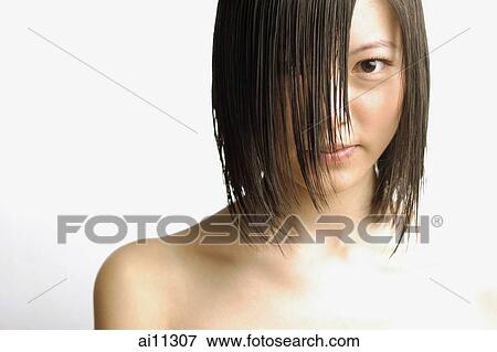 Young woman with wet hair, head shot View Large Photo Image Stock Photo - Young woman with wet hair, head shot. Fotosearch