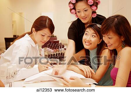 Young women at a beauty salon View Large Photo Image Stock Image - Young women at a beauty salon. Fotosearch
