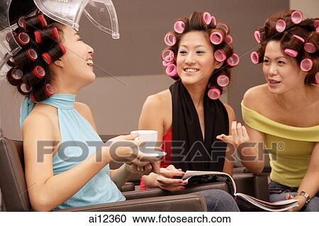 Young women at beauty salon, drinking tea and talking View Large Photo Image Stock Image - Young women at beauty salon, drinking tea and talking. Fotosearch