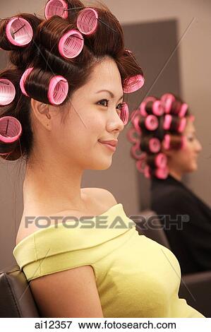 Young women at beauty salon View Large Photo Image Stock Photo - Young women at beauty salon. Fotosearch