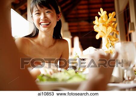 Young women at cafe, eating and talking View Large Photo Image Stock Image - Young women at cafe, eating and talking. Fotosearch