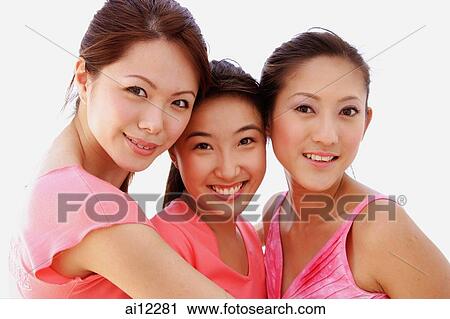 Young women looking at camera, portrait View Large Photo Image Stock Image - Young women looking at camera, portrait. Fotosearch
