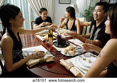Adults having dinner party View Large Photo Image Stock Image - Adults having dinner party. Fotosearch