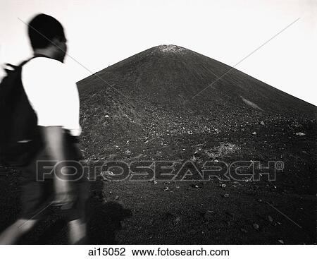 Asian male trekker on slopes of Krakatau volcano View Large Photo Image Stock Image - Asian male trekker on slopes of Krakatau volcano. Fotosearch