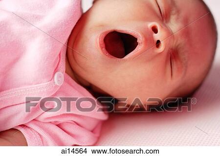 Baby lying down, yawning, eyes closed View Large Photo Image Picture - Baby lying down, yawning, eyes closed. Fotosearch