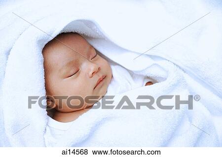 Baby wrapped in blanket, sleeping View Large Photo Image Stock Photo - Baby wrapped in blanket, sleeping. Fotosearch