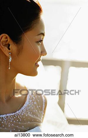 Stock Image - Bride looking away, profile. Fotosearch