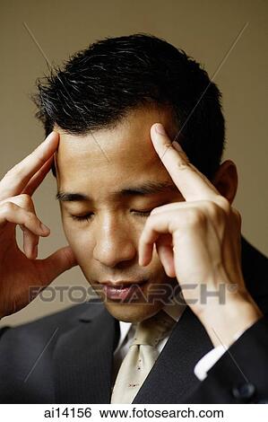 Businessman with hands on head View Large Photo Image Stock Photograph - Businessman with hands on head. Fotosearch