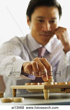 Businessmen playing chess, selective focus View Large Photo Image Stock Photo - Businessmen playing chess, selective focus. Fotosearch