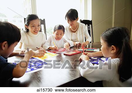 Children drawing, mother and grandmother next to them, watching View Large Photo Image Stock Image - Children drawing, mother and grandmother next to them, watching. Fotosearch