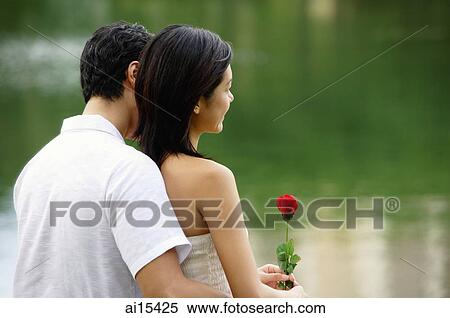 Couple embracing, rearview View Large Photo Image Stock Photography - Couple embracing, rearview. Fotosearch