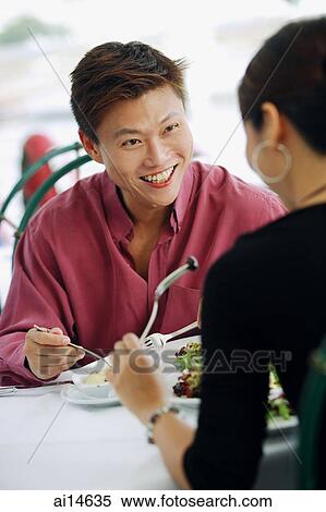 Stock Photography - Couple having lunch. Fotosearch