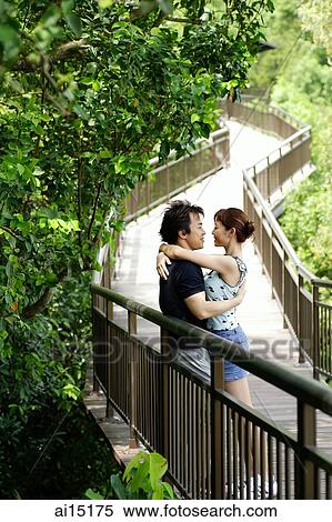Couple hugging in park View Large Photo Image Stock Photography - Couple hugging in park. Fotosearch